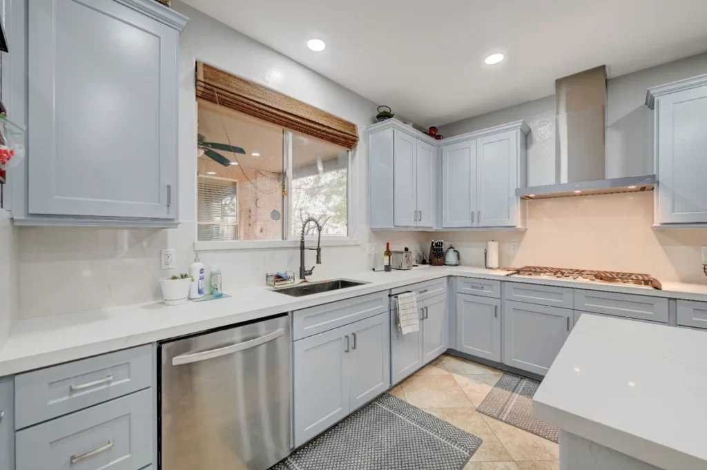 Modern Kitchen remodeled interior of a residential property at 7012 W Haldir Ave in Las Vegas by D&A Construction, featuring open layout with contemporary finishes and natural lighting."